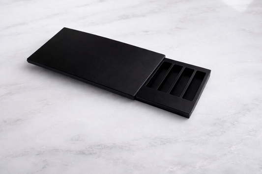 Black leather wallet on a marble surface